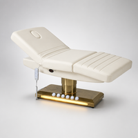 Lit de beauté électrique à 3 moteurs, colonne dorée brossée, base lumineuse LED chaude, trou pour le visage, pour thérapie, salon, spa, microblading, clinique