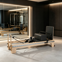 Machine de Pilates Reformer en bois d'érable avec rails en acier inoxydable à haute résistance, ressorts et accessoires pour studio et salle de sport