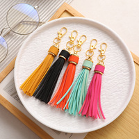 Porte-clés transfrontalier en cuir PU avec pompon, bracelet en silicone, accessoires à pompon, pendentif de sac, porte-clés en cuir