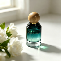 Nouveaux flacons de parfum design 50ml, vert dégradé, épaule inclinée, atomiseur rechargeable, emballage en verre avec couvercle en bois