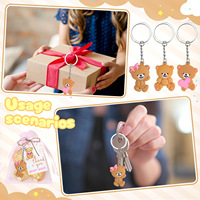 Ensemble de porte-clés mignons en forme d'ours DAMAI avec des sacs en organza rose et des étiquettes de remerciement pour les cadeaux de fête de naissance ou d'anniversaire