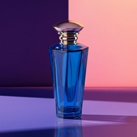 Nouvelle conception de flacon de parfum en verre à col cranté de forme unique, 100 ml, ambre bleu, flacon de parfum vide avec vaporisateur à fine brume