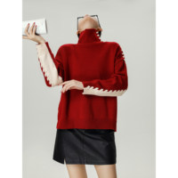 Pull en cachemire tricoté à col montant avec empiècements contrastants en ruban rouge et blanc, nouvelle collection automne-hiver