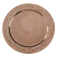 Assiette de présentation en cuivre martelé rond
