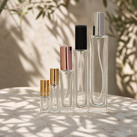 Meilleur prix de gros pour flacon de parfum en verre cylindrique haut avec pompe pulvérisatrice métallique pour les marques de cosmétiques et de soins personnels
