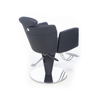 Chaise de barbier noire élégante vintage haut de gamme avec accessoires de quincaillerie uniques pour salon de coiffure