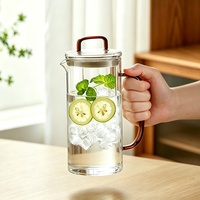 Nouvelle Tendance : Ensemble de service à eau et thé en verre contemporain de 1300 ml avec poignée, couvercle et bec verseur, écologique et résistant à la chaleur, pour eau froide et chaude, thé et cuisine