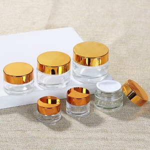 ขายส่งบรรจุภัณฑ์เครื่องสำอางแบบขวดแก้วขนาด 30 กรัม 1 ออนซ์ เป็นมิตรกับสิ่งแวดล้อม พร้อมฝาสีทองและสีเงิน - Product Image 5