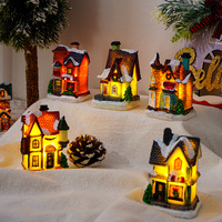 Casas de Resina en Miniatura para Decoración Navideña, con Luces LED Cálidas, Aldeas Navideñas Iluminadas, Iglesia y Cabaña Cubiertas de Nieve