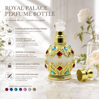 Nouveau produit : Flacon de parfum arabe 10 ml, exquis, avec filigrane doré et bijoux, et applicateur en verre.