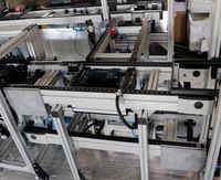 Transportador de Cadena de Doble Velocidad de Bajo Ruido para el Transporte Preciso de Productos en Líneas de Producción de Industrias de Maquinaria