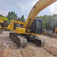 Excavatrice Cat 320DGC avec godet de terrassement, poids opérationnel de 12 tonnes, d'occasion