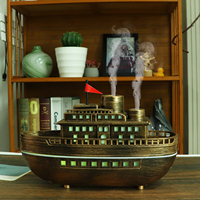 Diffuseur d'ambiance en forme de bateau couleur bronze avec lumières LED 7 couleurs. Plusieurs couleurs au choix. Dernier design de forme.