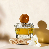 Flacon de parfum en verre délicat en forme de gâteau de 70 ml avec vaporisateur pompe rechargeable vide de luxe