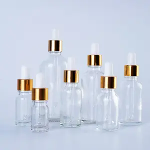 Cosmetic Glass Dropper Bottle 5ml 10ml 20ml 50ml 60ml 100ml Essential Oil Gold Aluminum Cap Packaging Dropper Glass Bottle Cosmetic Clear Glass Bottles