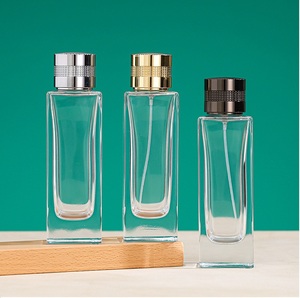 Nuevo Diseño, Botella de Vidrio Transparente Cuadrada Redonda de Lujo de 100 ml para Perfume en Aerosol para Hombre y Mujer, con Caja y Tapa - Product Image 1