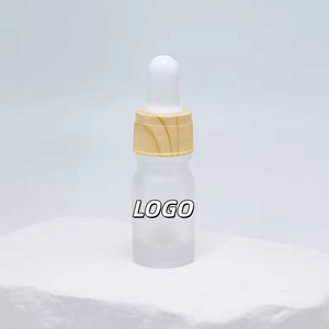 Botella de aceite esencial al por mayor con tapa de rosca, hombro plano, varios estilos, personalizable, 1ml-5ml, tapa con textura de madera, botella cuentagotas vacía - Product Image 1