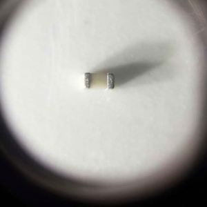 Whole -Sale C0402X7R104J250NTBF 0402 1005 Capacitors SMD Capacitors 100nF 5% 25V X7R - Product Image 1