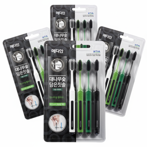 Lot de 4 brosses à dents médianes remplies de charbon de bambou types de poils durs et moyens pour voyage ou hôtel emballés dans une boîte - Product Image 1