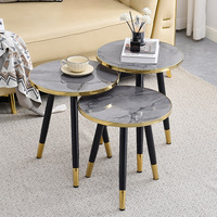 Table basse circulaire moderne combinée pour petits appartements, idéale pour les zones de réception haut de gamme et les salons simples