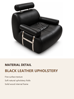 Fauteuil d'appoint en cuir noir rembourré avec appui-tête cylindrique et accoudoirs métalliques pour salon et hôtel
