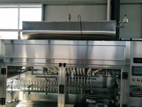 Machine de remplissage automatique linéaire pour détergent à lessive, shampoing, cosmétiques, bouteilles