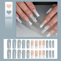 Uñas postizas francesas largas estilo ataúd con cruz de diamantes de imitación estrella blanca K002, estilo occidental, ABS de primera calidad, en stock, MOQ1, venta al por mayor, fácil aplicación.