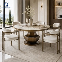 Table de salle à manger ronde moderne pour restaurant, plateau en pierre frittée, base en acier bronze brossé, pour projets hôteliers et villas, vente en gros directe usine