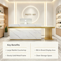 Comptoir de réception en marbre de luxe léger avec cadre métallique doré, comptoir d'accueil moderne pour salon de beauté et spa, OEM