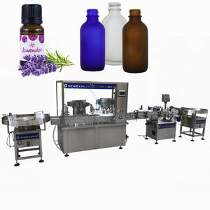 Machine de remplissage automatique de bouteilles en plastique/verre contrôlée par PLC pour huiles essentielles, sérums et boissons, 10ml, 30ml, 50ml, 60ml, fabriquée à Shanghai - Product Image 1