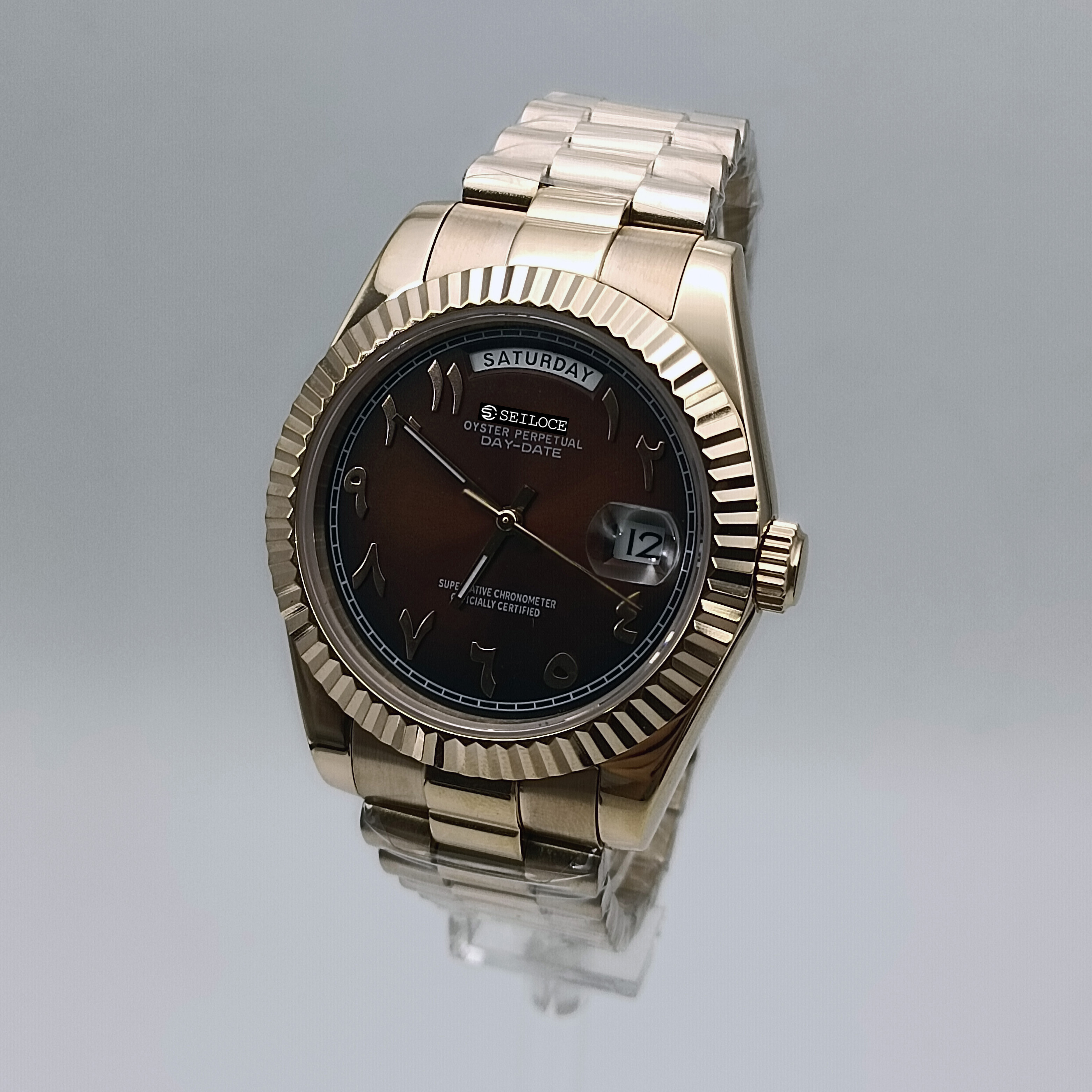 Boîtier en or rose + cadran marron