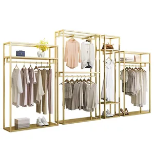 Exhibidor de ropa de Boutique, estante de Metal dorado de acero inoxidable cromado para tienda
