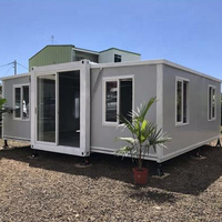 Maison conteneur extensible de 20 pieds, gris clair, avec terrasse blanche, préfabriquée modulaire, unité d'habitation autonome pour jardin arrière de maison au Royaume-Uni