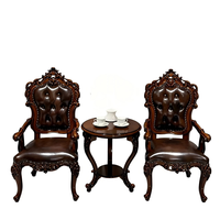 Fauteuil de loisirs en cuir véritable de première qualité de style européen avec accoudoirs sculptés et petite table intégrée pour salon et bureau