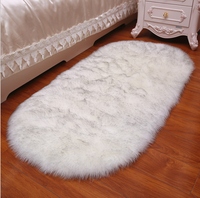 Tapis en peluche de luxe de couleur unie tapis de boule régionale tapis lavable en fausse fourrure