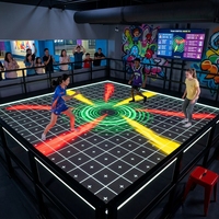 Système de jeu interactif au sol à LED avec 6 jeux d'équipe populaires pour les centres sportifs virtuels et les aires de jeux intérieures