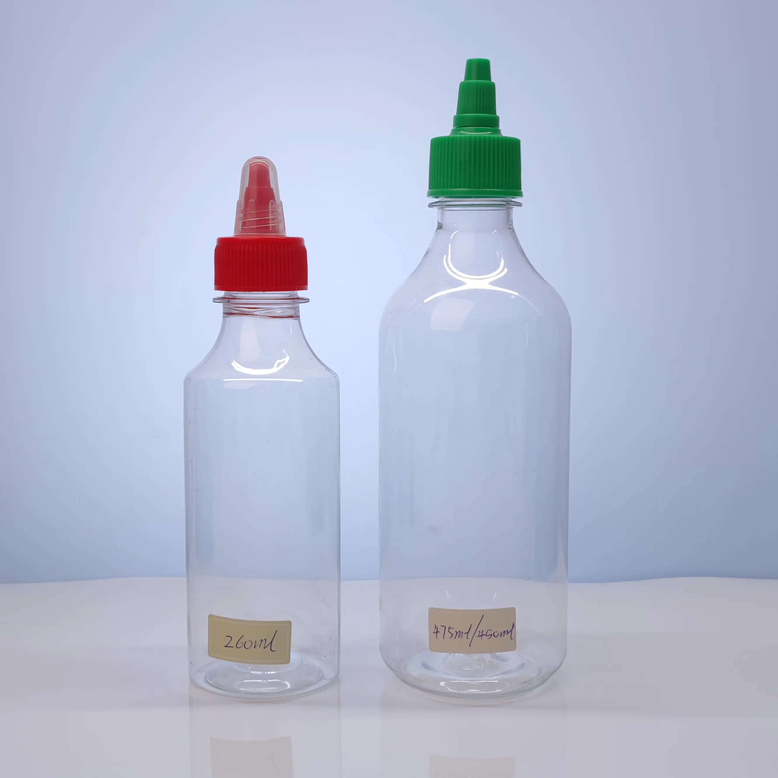 Sıcak satış 260ml 280ml 475ml plastik PET mutfak sıkılabilir şişe için bal ucu kapaklı 16Oz ketçap sos şişeleri