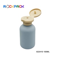 Flacons cosmétiques ronds en plastique givré de 100 ml avec bouchon à clapet pour lotion