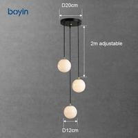 Lustre minimaliste postmoderne en albâtre, lampe suspendue sphérique artistique multi-lumières pour escalier, villa, salon