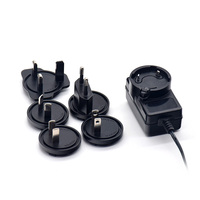 Chargeur de bureau interchangeable 12V 1.5A avec prise DC standard britannique, protection OVP/OTP/SCP, 18W CC-CV pour éclairage LED et usage médical
