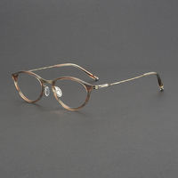 Lunettes sans vis en titane en gros pour hommes et femmes, design patchwork tendance avec monture en acétate rose et verres optiques