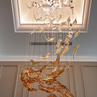 Lustres LED modernes de luxe en verre long, personnalisables, pour villas, restaurants haut de gamme et escaliers – Prix fabricant