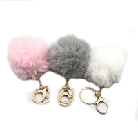 Porte-clés mousqueton vintage en gros, avec pompon et boule décorative mignonne, idéal pour cadeaux d'entreprise