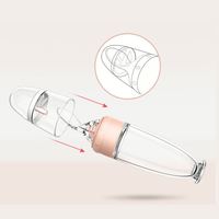 Haute qualité 100% Silicone de qualité alimentaire nouveau-né bébé biberon bébé pressant biberon avec cuillère