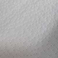 Tissu en polyester blanc premium à pois avec surface douce et respirante pour housse de lit et tissu de matelas tricoté