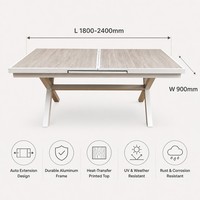 Table à manger extensible d'extérieur avec structure en aluminium, design moderne et durable pour villa