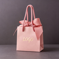 Sac en papier rose OEM avec poignée en corde et nœud en satin pour faible MOQ