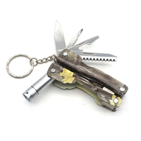 Cadeau promotionnel OEM, outil de poche EDC, porte-clés, couteau en acier inoxydable, lame dentelée, outil multifonction portable miniature, LED