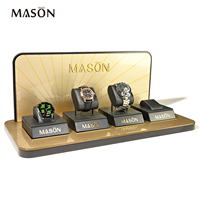 Support de présentation de montres de luxe Mason Fine Watch, pour 4 montres, en verre organique et métal, pour vitrine de magasin de montres