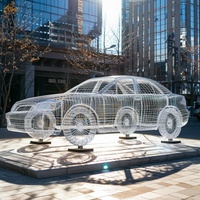Grande sculpture moderne de modèle de voiture de rue extérieure personnalisée 304/316SS en fil d'acier inoxydable évidé grandeur nature pour la décoration publique